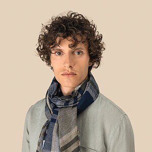 Uniseks tulbanddoek met ruit- en streepmotief.